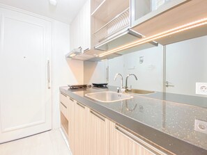 Standard Studio | Private kitchen - Spacious Studio At Landmark Residence Bandung Apartment (Bandung)