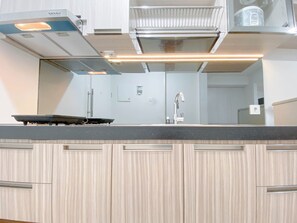 Standard Studio | Private kitchen - Spacious Studio At Landmark Residence Bandung Apartment (Bandung)