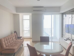 Standard Apartment | Living room - Pleasant And Calm 2Br At Grand Sungkono Lagoon Apartment (Surabaya)