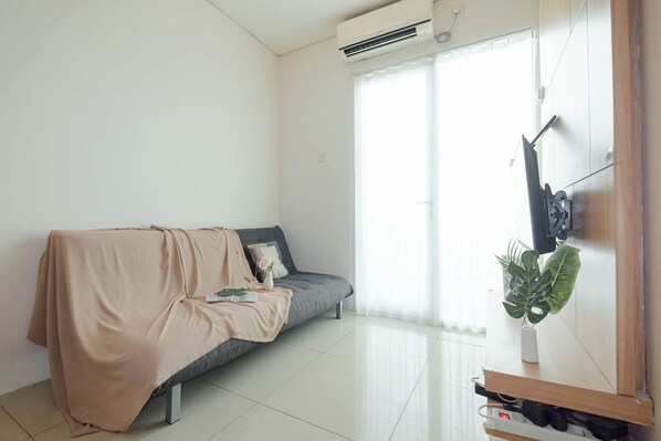 Apartamento standard | Área de estar