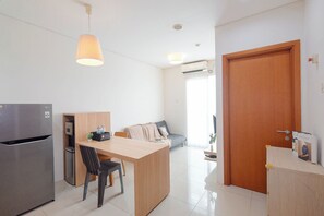 Apartamento standard | Opções para refeição no quarto