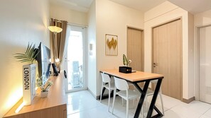 Apartamento standard | Opções para refeição no quarto