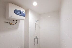 Standard Apartment | Bathroom - Basic Studio Room Apartment At Tuscany Residence (South Tangerang)