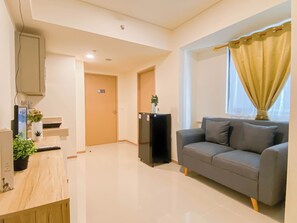 Apartamento standard | Área de estar