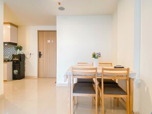 Standard Apartment | In-room dining - 3Br Apartment Near Dian Harapan School At Meikarta (Cikarang)
