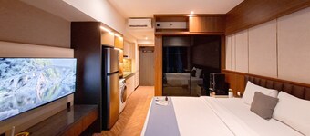 Modern Rustic Studio Apartment At Carstensz Residence