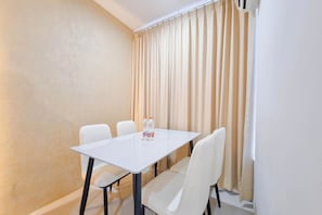 Standard Apartment | In-room dining - Spacious 2Br At Green Park Yogyakarta Apartment (Depok)