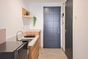 Standard Apartment | Private kitchen - Studio Apartment Near Binus @Alam Sutera At Collins Boulevard (Tangerang)