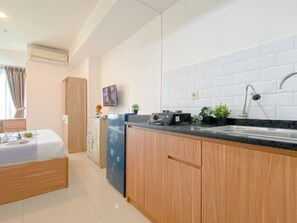 Standard Apartment | Private kitchen - Studio Apartment Direct Access To Mall At Grand Kamala Lagoon (Bekasi)