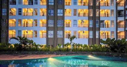 Grey Toned 1Br Apartment Tamansari Skylounge Makassar