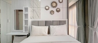 Grey Toned 1Br Apartment Tamansari Skylounge Makassar