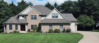 Luxury 5-bedroom 5000 sq ft house on wooded lot in Geneseo, rec & fitness rooms