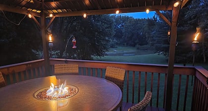 Luxury 5 BR home on private wooded lot near QC, w/hot tub, rec & fitness room