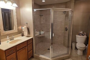 Shower, hair dryer, towels, soap
