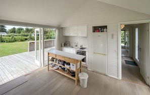 Fridge, stovetop, dishwasher, coffee/tea maker