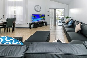 Smart TV, fireplace, table football, books
