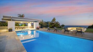 Outdoor pool, pool umbrellas, sun loungers