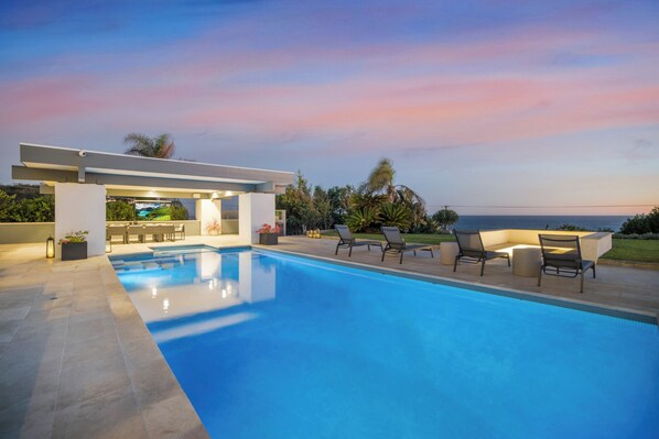 Outdoor pool, pool umbrellas, sun loungers