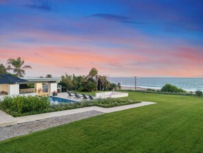 Outdoor pool, pool umbrellas, sun loungers