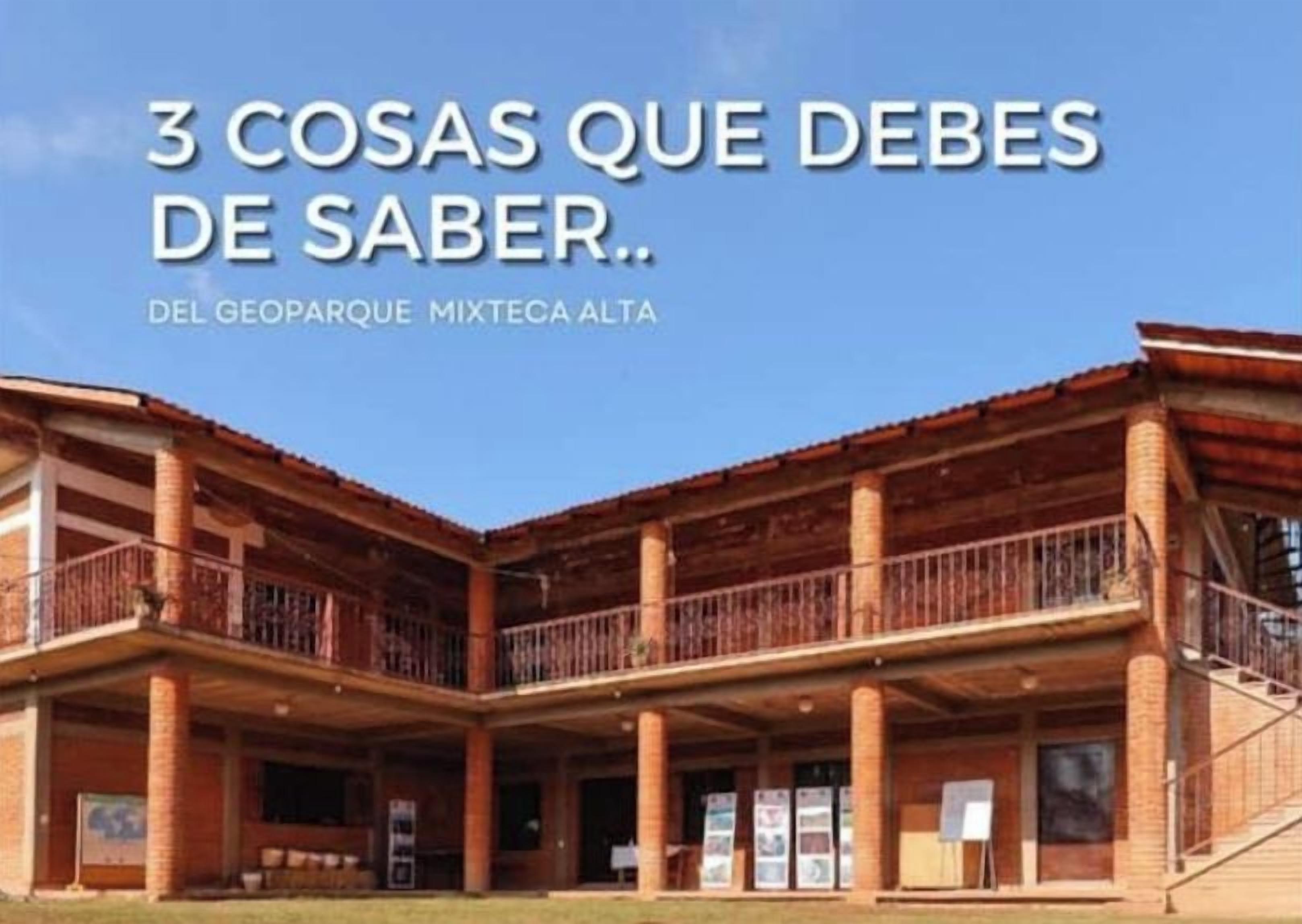 A building with a courtyard, multiple balconies, and a sign indicating it's a geodesic park.