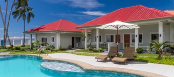 Luxury 2-bedroom Beachfront Villa with AC. Discounted long term stay rates
