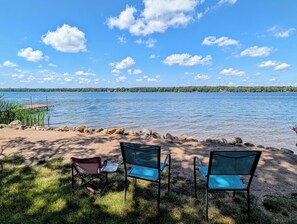 On the beach, sun-loungers