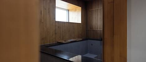 Deep soaking tub, hair dryer, bathrobes, bidet