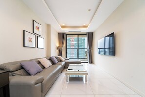 Superior Apartment, 2 Bedrooms, Balcony, City View | Living area - The Rixx Madison Tower With Pool and Gym (Ben nghe quan mot)