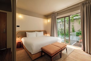 Deluxe Suite, 2 Bedrooms | Premium bedding, down comforters, in-room safe, individually decorated