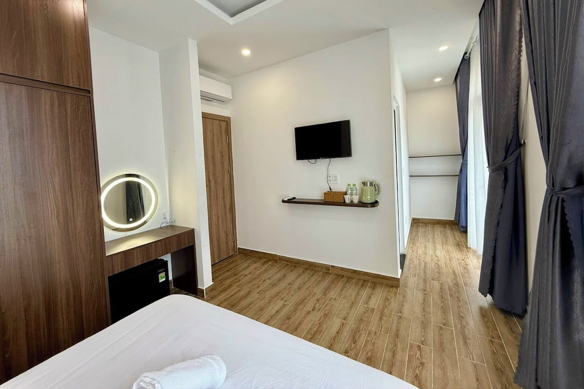 Basic Double Room, City View | Blackout drapes, iron/ironing board, free WiFi