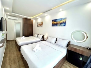 Family Quadruple Room, City View | Blackout drapes, iron/ironing board, free WiFi