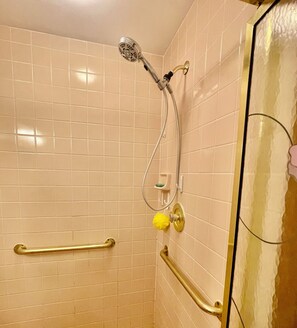 Shower, hair dryer, towels, soap