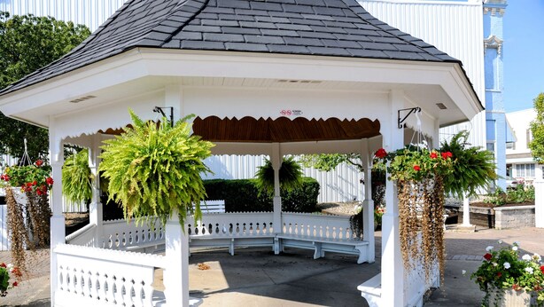 A gazebo with a white exterior, a wooden roof, and a white fence surrounding it. - 3-BR + Firepit, Coffee Bar & Grill (Bourbon)