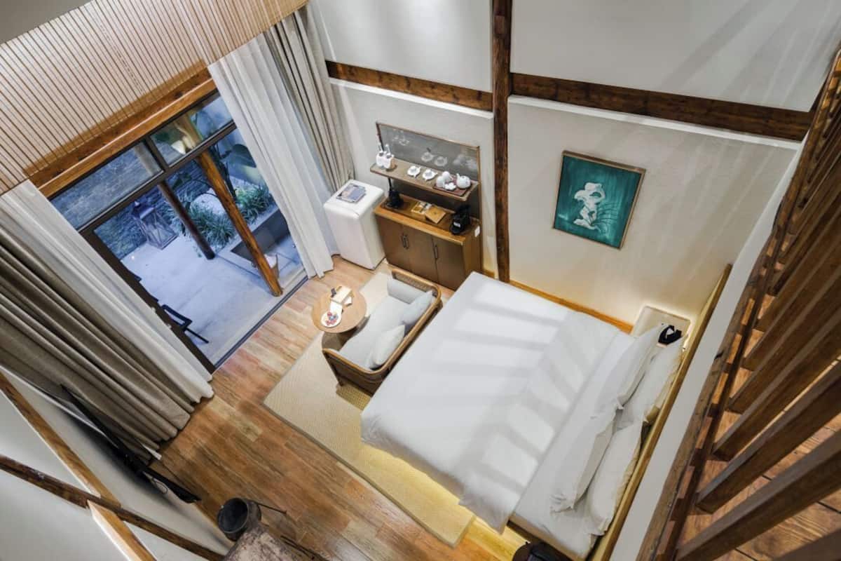 Luxury Suite, 2 Bedrooms, Courtyard View, Mezzanine | In-room safe, individually decorated, individually furnished