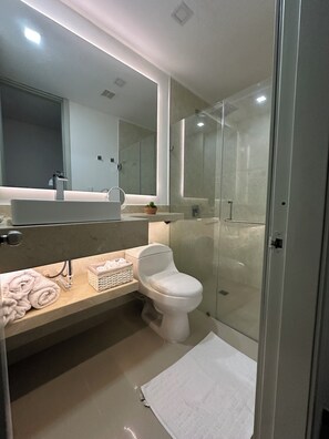 Hair dryer, towels, soap, toilet paper