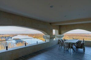 Premium Suite | Desk, blackout drapes, iron/ironing board, free WiFi