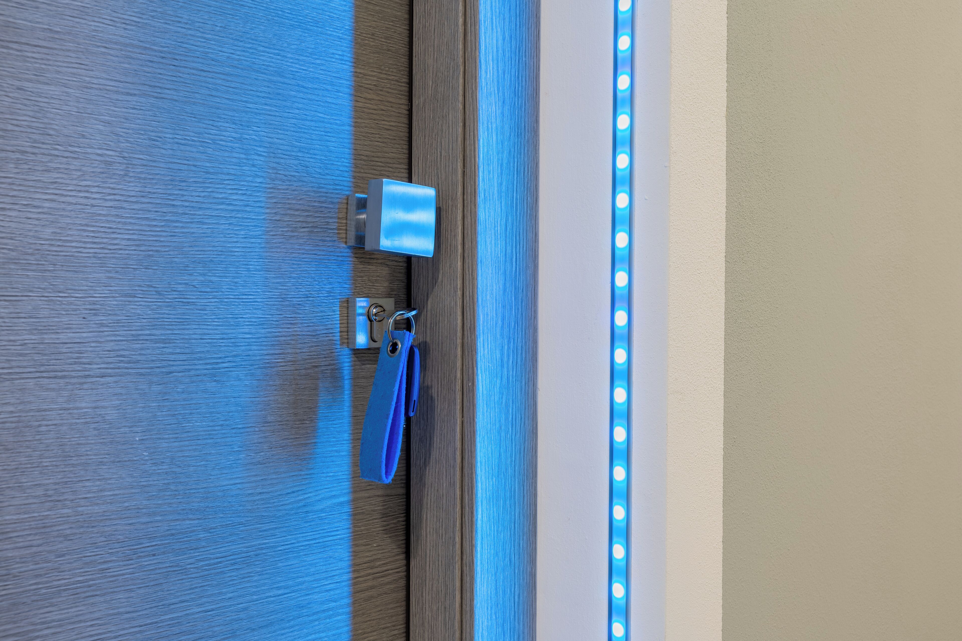 A door with a keyhole, a lock, and a keychain.