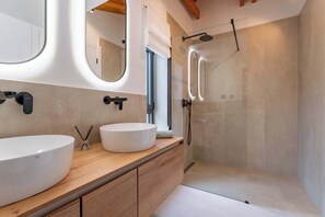 Shower, hair dryer, towels, toilet paper