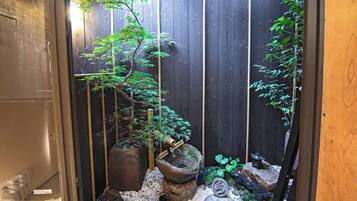 Bungalow | Living area | 30-inch TV with cable channels