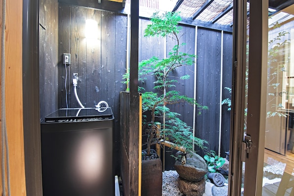 Bungalow | Living area | 30-inch TV with cable channels