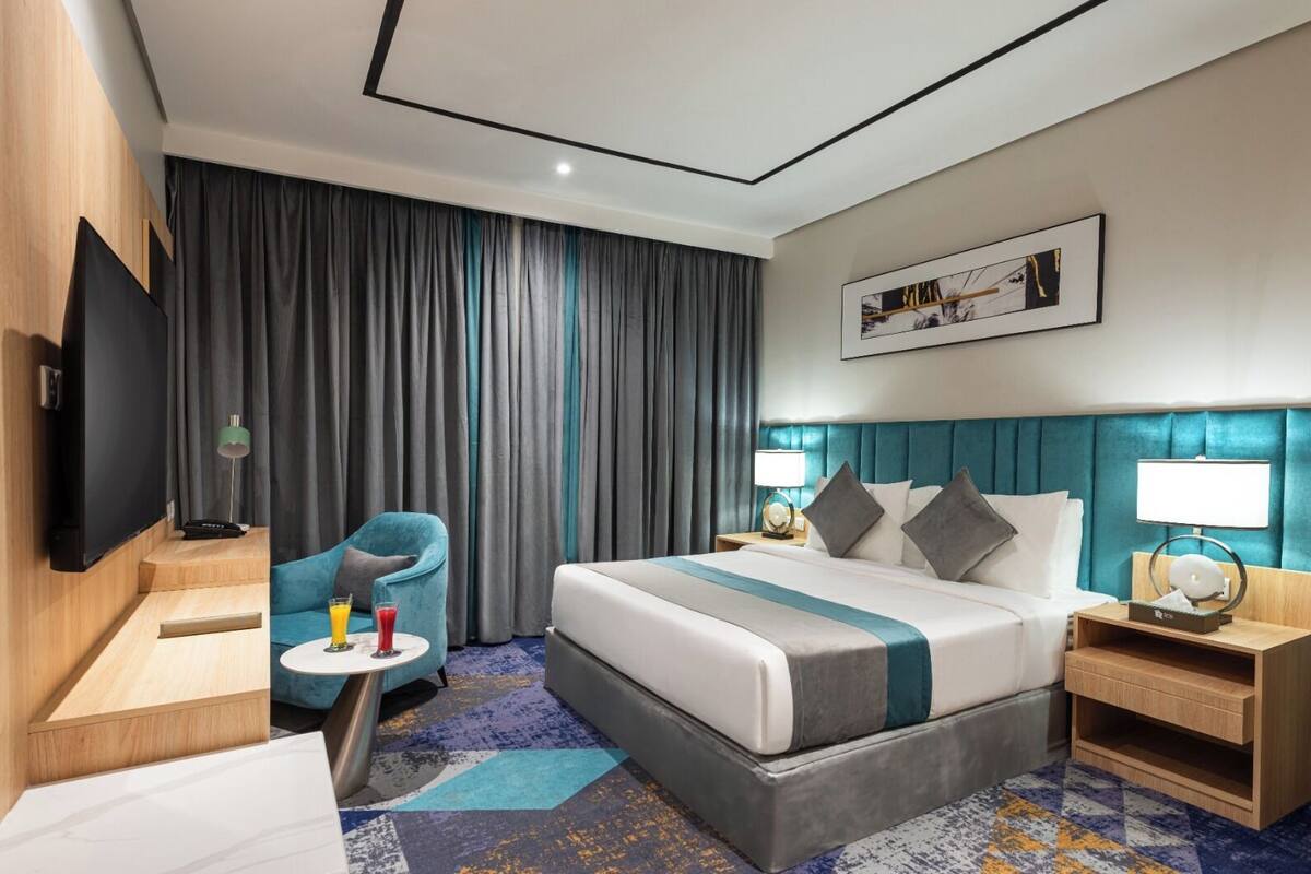 Kamar Deluks | Seprai antialergi, minibar, kedap suara, dan setrika/meja setrika