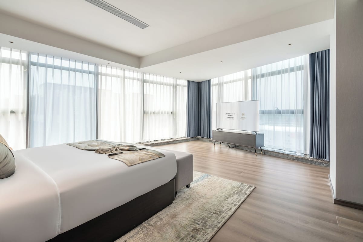 Luxury Suite, City View | Blackout curtains, iron/ironing board, free WiFi