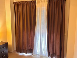 Family Apartment, 2 Bedrooms, Kitchen, City View | Iron/ironing board, free WiFi - Sombrero Holiday Apartments (Fuengirola)