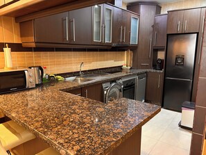 Family Apartment, 2 Bedrooms, Kitchen, City View | Private kitchen - Sombrero Holiday Apartments (Fuengirola)