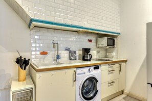 Fridge, microwave, cookware/dishes/utensils