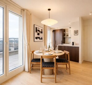 Deluxe Penthouse, City View | Living area