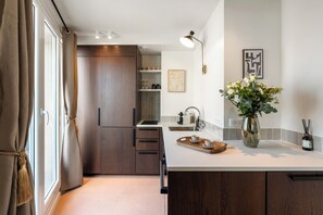 Deluxe Penthouse, City View | Private kitchen | Espresso maker, electric kettle, toaster, freezer