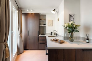 Deluxe Penthouse, City View | Private kitchen | Espresso maker, electric kettle, toaster, freezer
