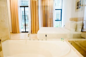 Costa 2 Bedrooms with Balcony | Bathroom | Hair dryer, towels, soap, shampoo