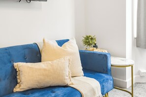 Family Apartment, Non Smoking | Living area | 32-inch Smart TV with digital channels, streaming services